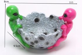 GREEN/PINK ALIEN RESIN ASHTRAY - 10 X 13CM